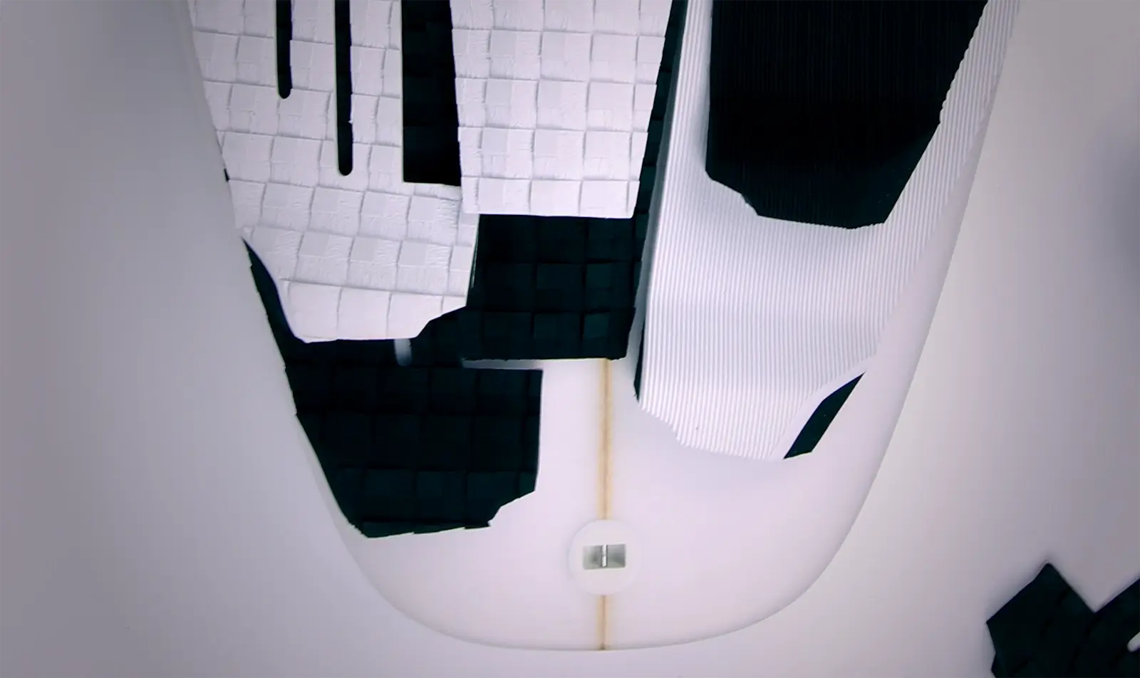 Unveiling the Traction Pad: The Grip Revolutionizing Surfboard Traction